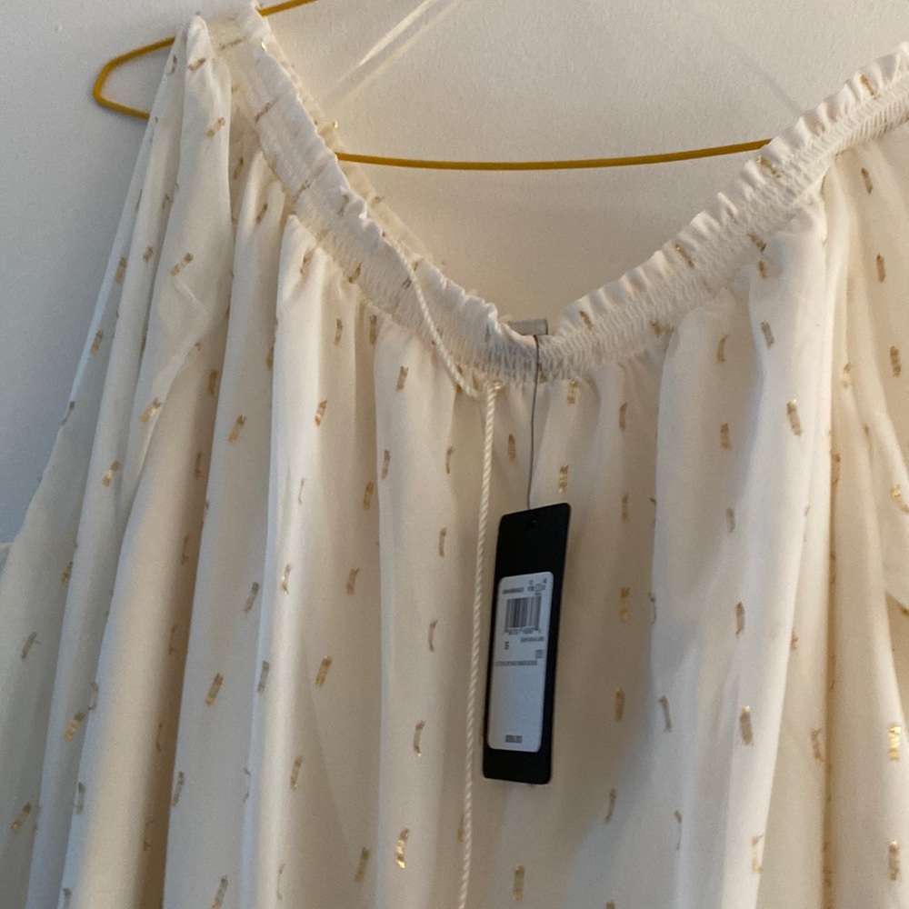 Beautiful guess white and gold lined with cutout sleeve blouse